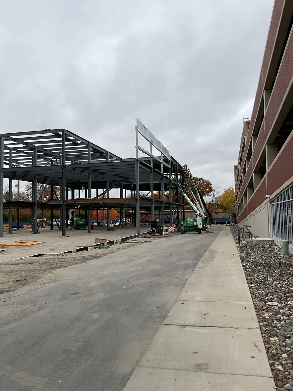 Aurora University Learning Commons: the frame alongside the parking structure