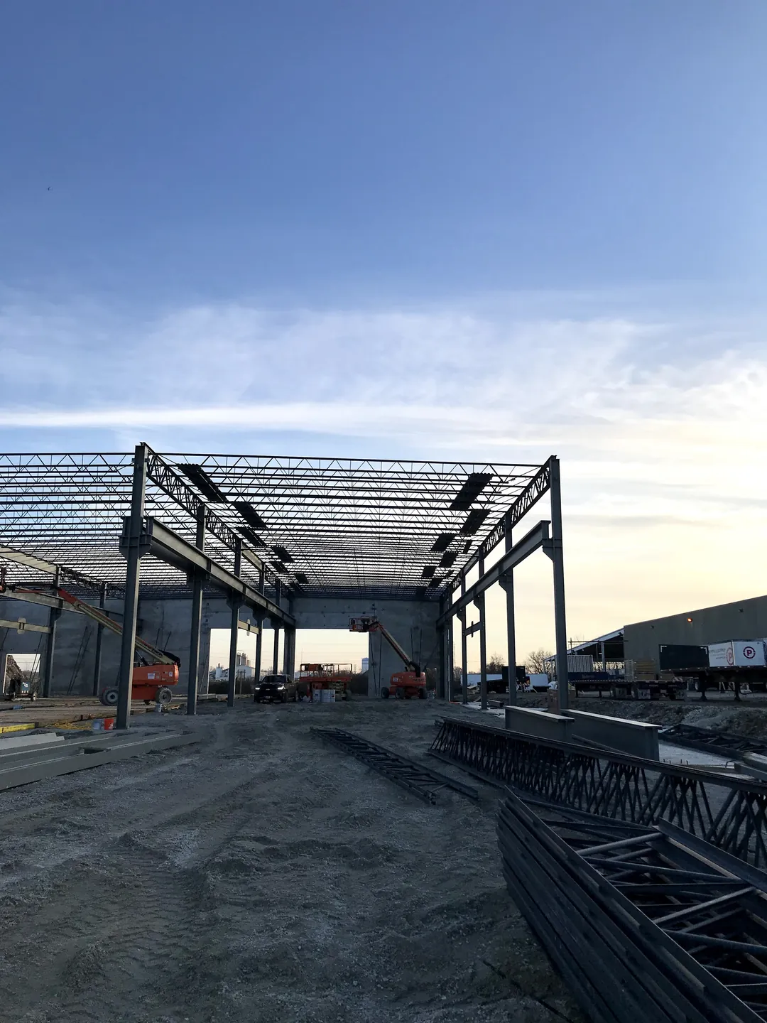 Bulldog Cartage: the end frame of the building, with joists stacked in the foreground