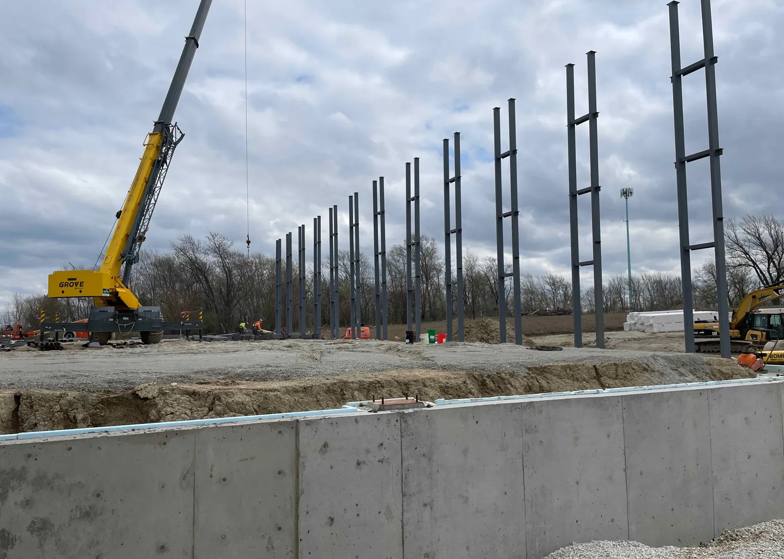 DOT Foods: a crane beside a row of steel columns going up