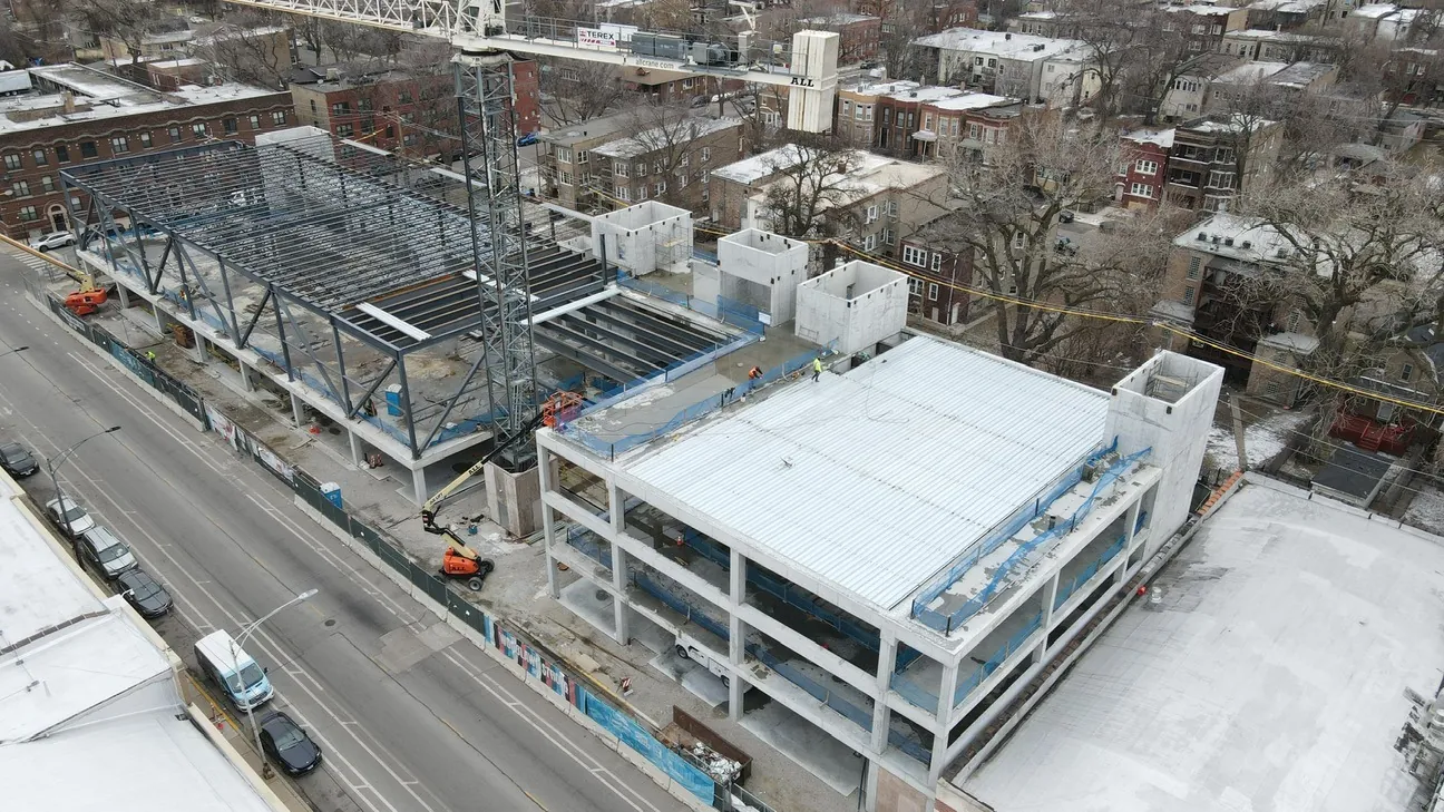 Project HOOD: aerial view of the building, with steel framing on the upper level