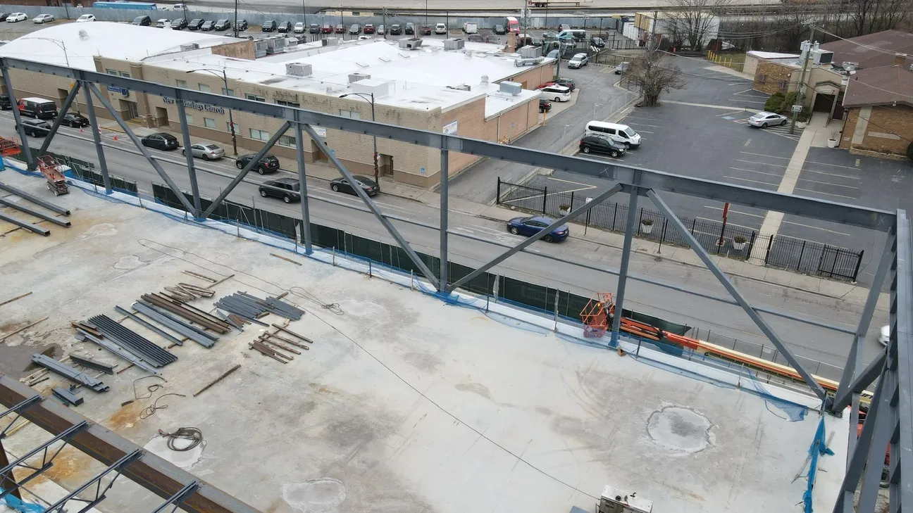 Project HOOD: a steel truss along the edge of the deck, with the street below