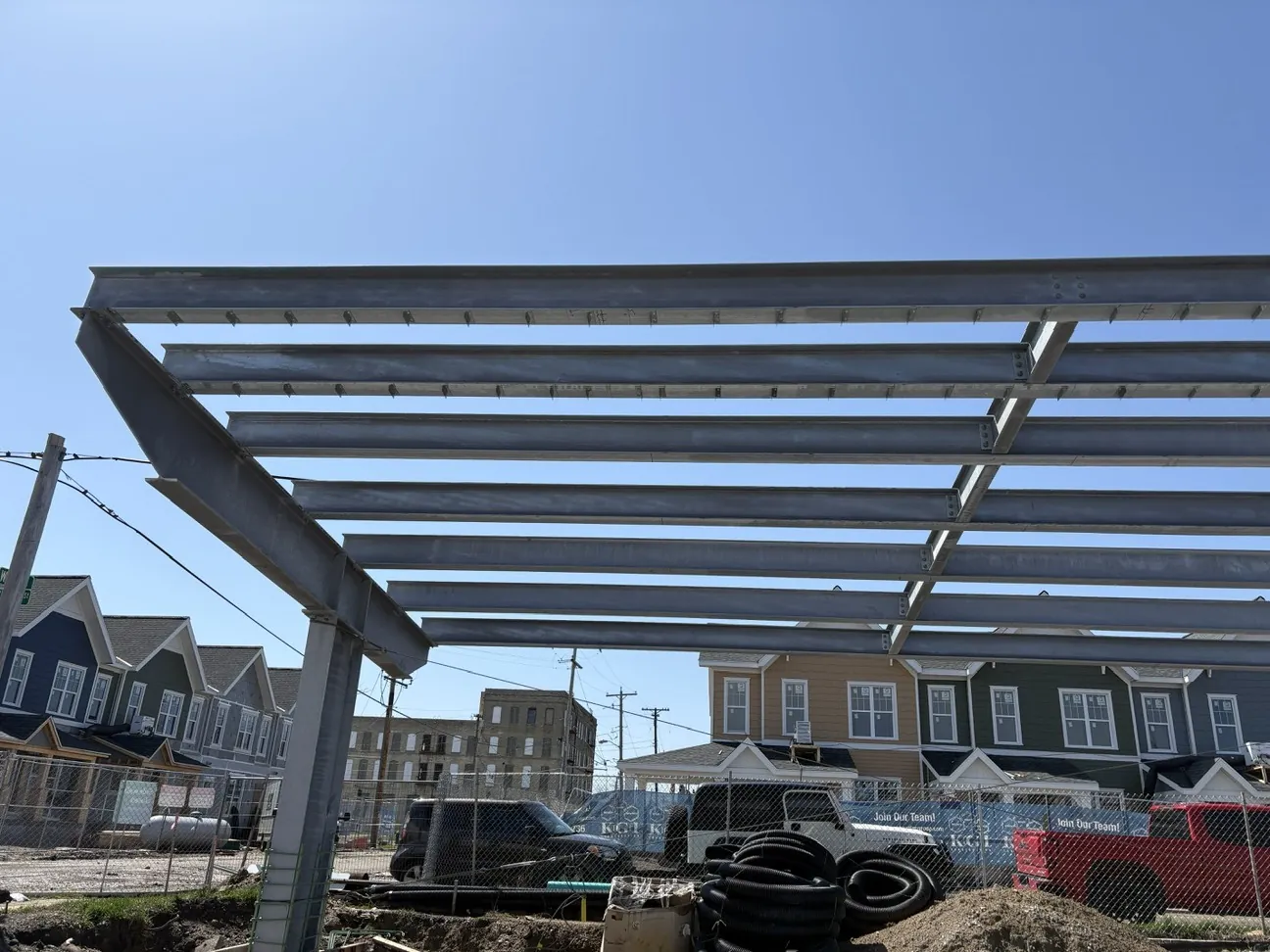 Lincoln King Center: the galvanized canopy framing, with the neighborhood behind