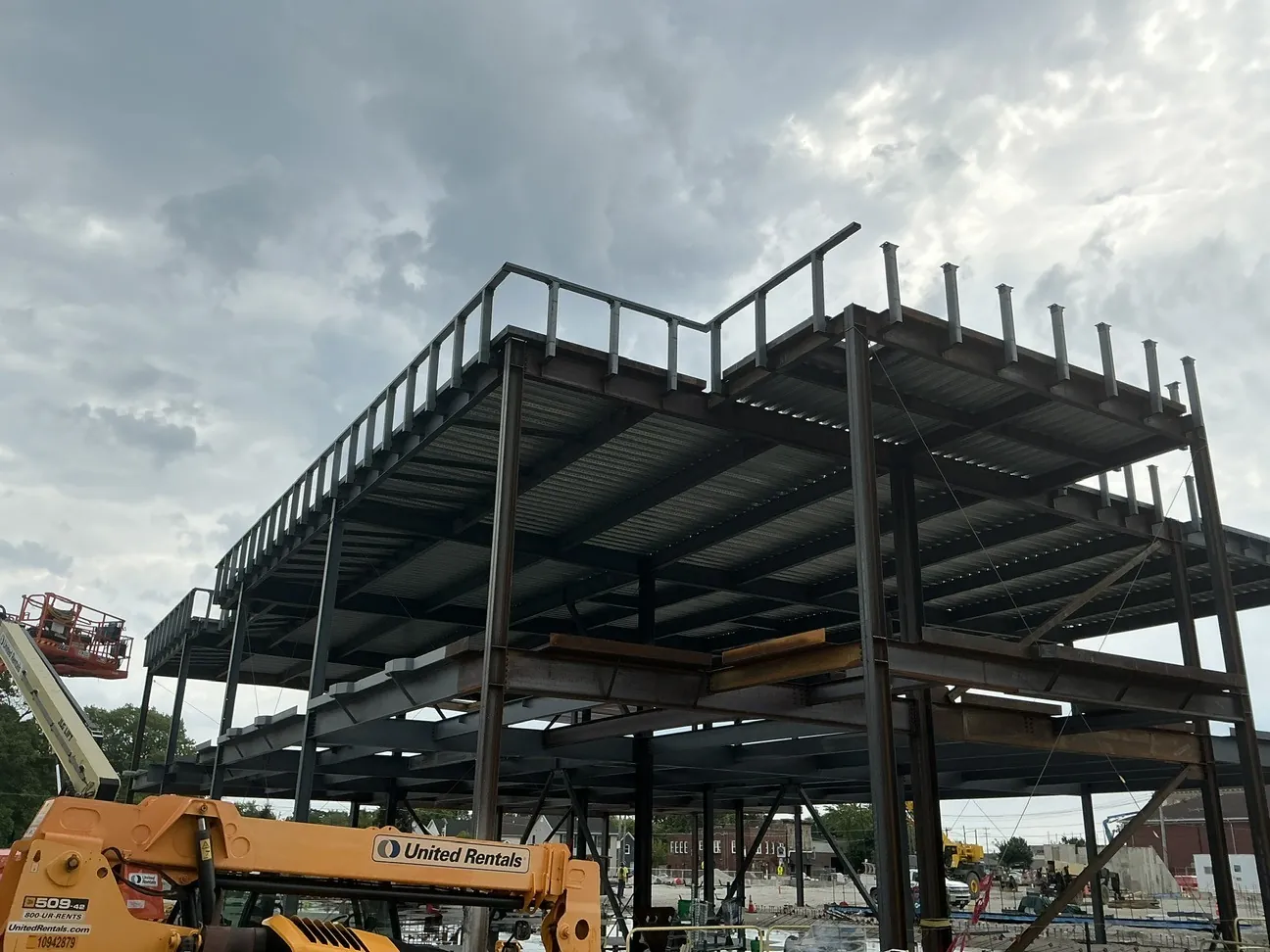 Lincoln King Center: floor deck and roof railing posts on the multi-story frame