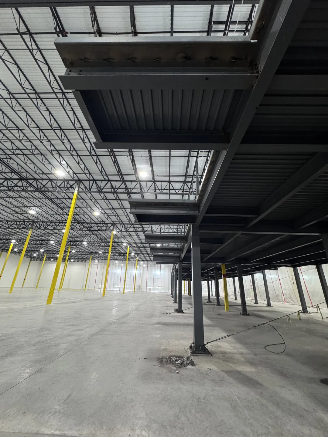 Project Maverick: the mezzanine edge and framing seen from below