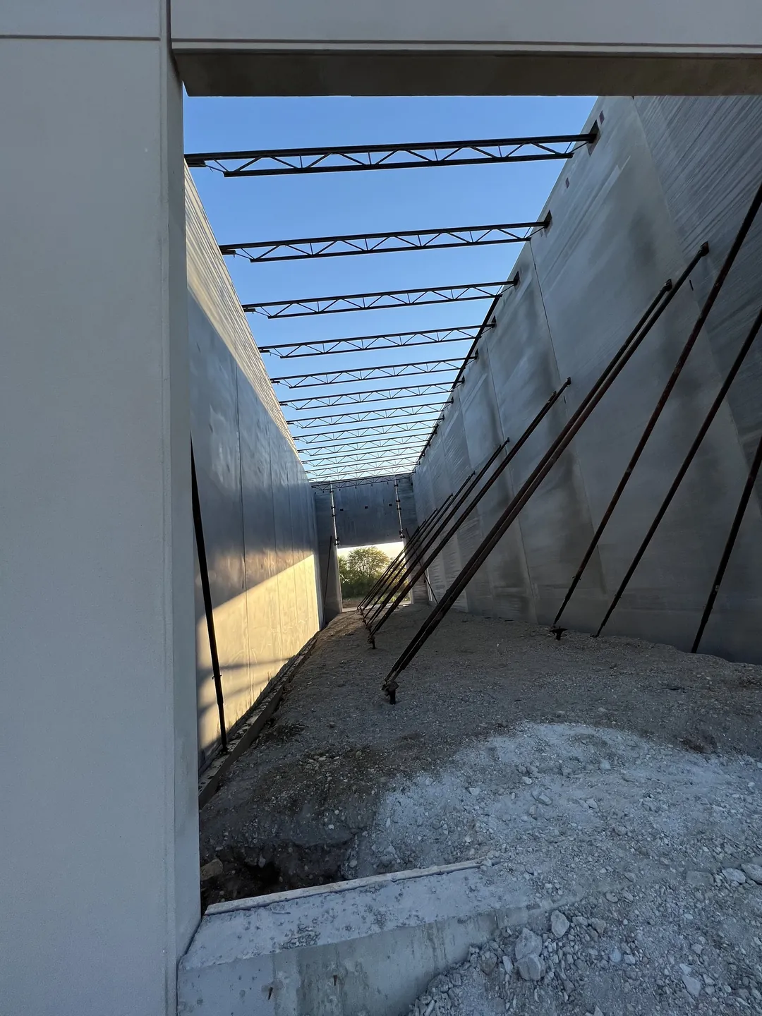Montgomery Public Works: roof joists seen through a gap between the precast panels