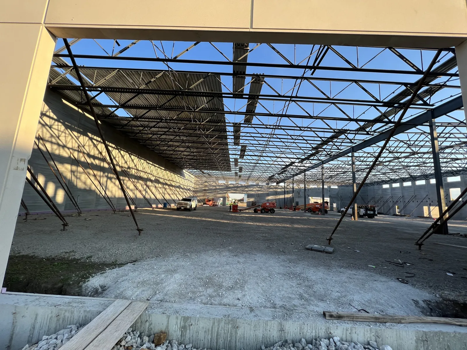 Montgomery Public Works: roof deck partly installed across the joists
