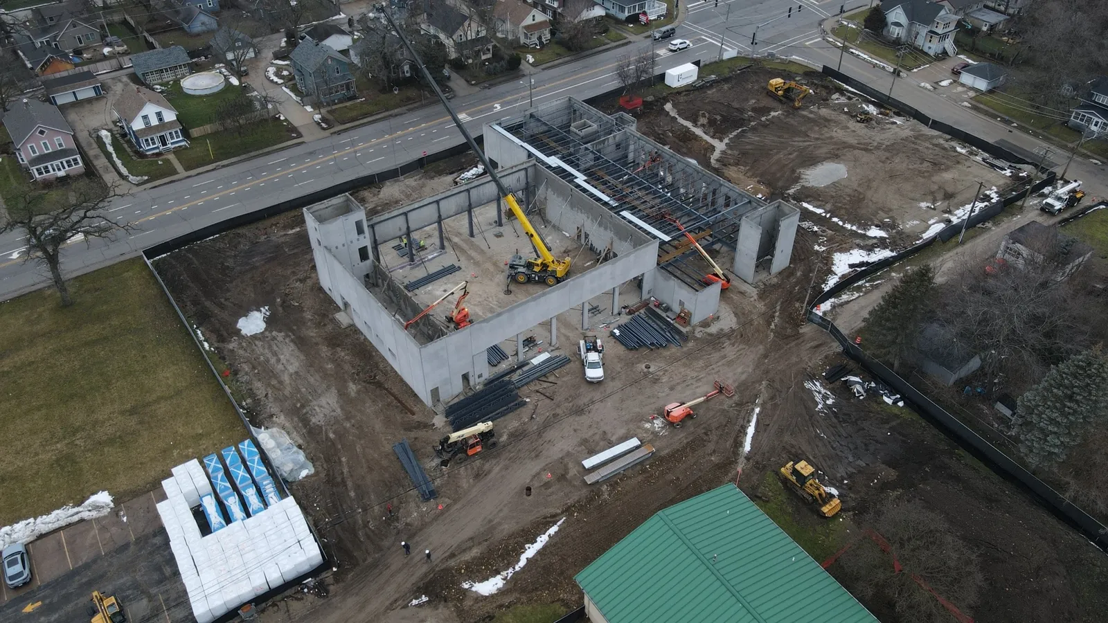 North Aurora Fire District Headquarters: aerial view of the site, with the crane working inside the walls
