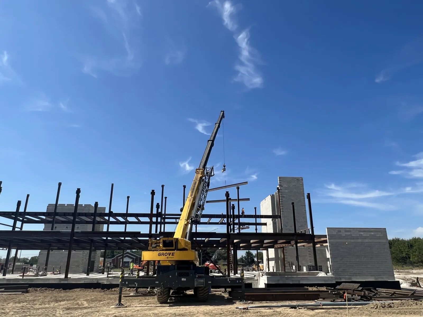 Northwest Community Cancer Center: a rough-terrain crane working beside the columns and floor beams