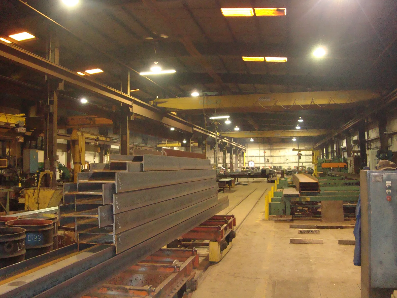 Structural steel stock racked inside the Garbe Iron Works shop